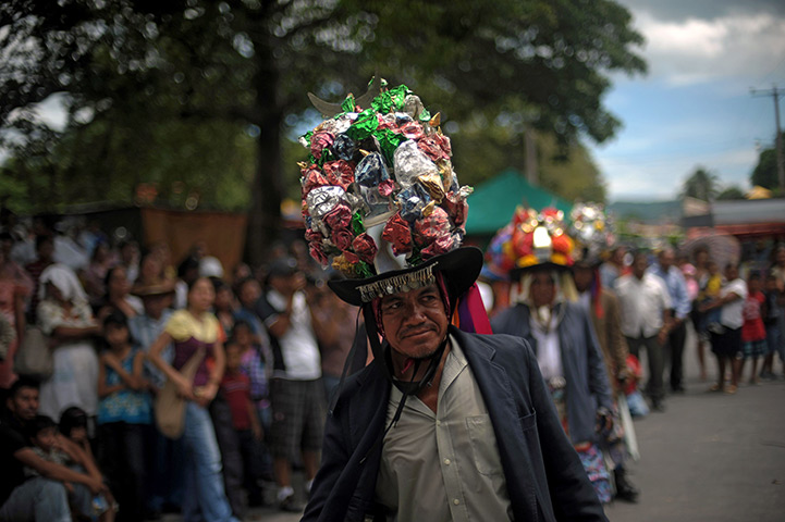 24 hours in pictures: Dance group perform during a traditional dance festival in Santiago