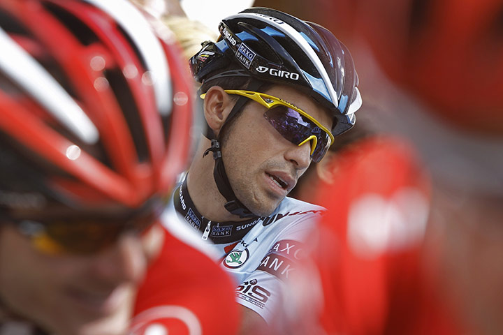 Tour de france stage 16: Alberto Contador chats with a fellow rider before the start of the stage