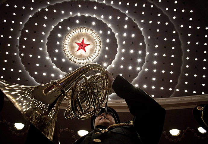 24 Hours: A band member rehearses ahead of the Communist Party's 90th anniversary