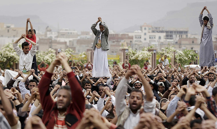 24 Hours: Anti-government protestors gesture during a demonstration in Yemin