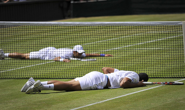 24 Hours: Novak Djokovic and Jo-Wilfried Tsonga lay on the ground during Wimbledon
