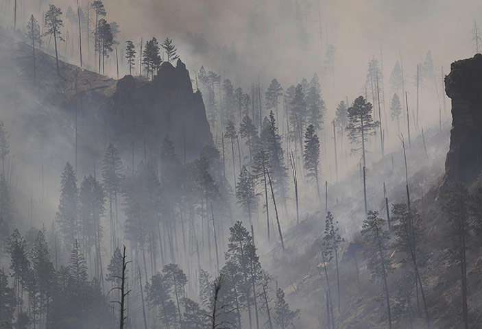 24 Hours: Los Alamos Canyon is filled with smoke from the Las Conchas fire