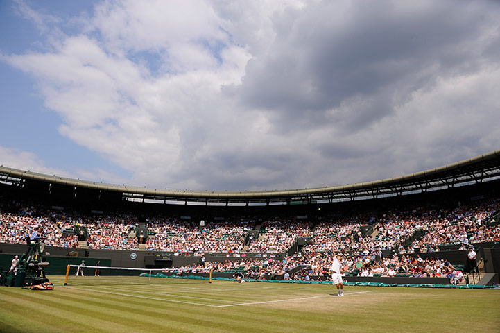 Wimbledon day 12: Liam Broady serves in the Boy's final