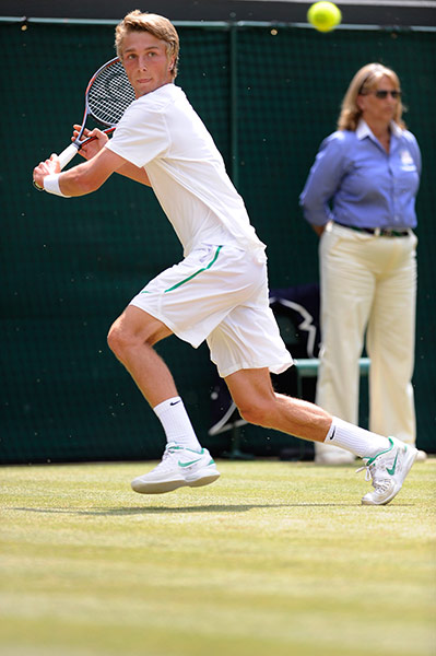 Wimbledon day 12: Liam Broady chases a ball in the Boys final
