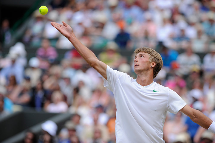 Wimbledon day 12: Liam Broady serves