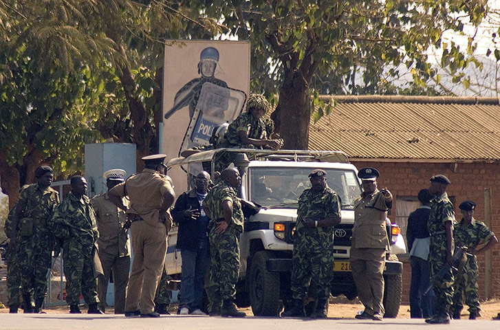 Malawi protests: Malawi police patrol on the street of Lilongwe 
