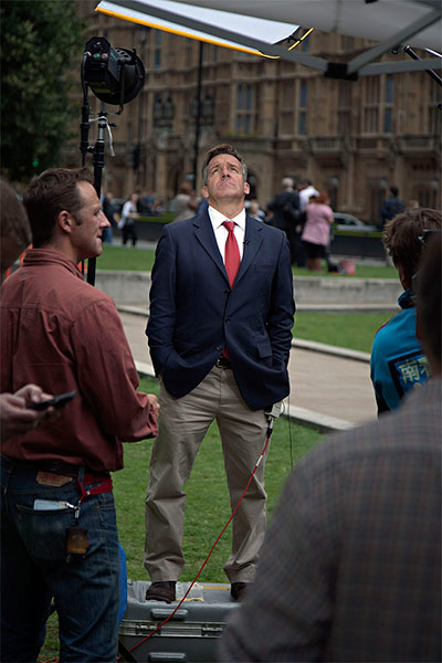 College Green media: An American tv news reporter waits to speak at College Green
