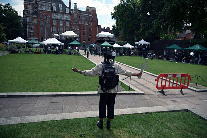 College Green media: A Christian woman protests at College Green