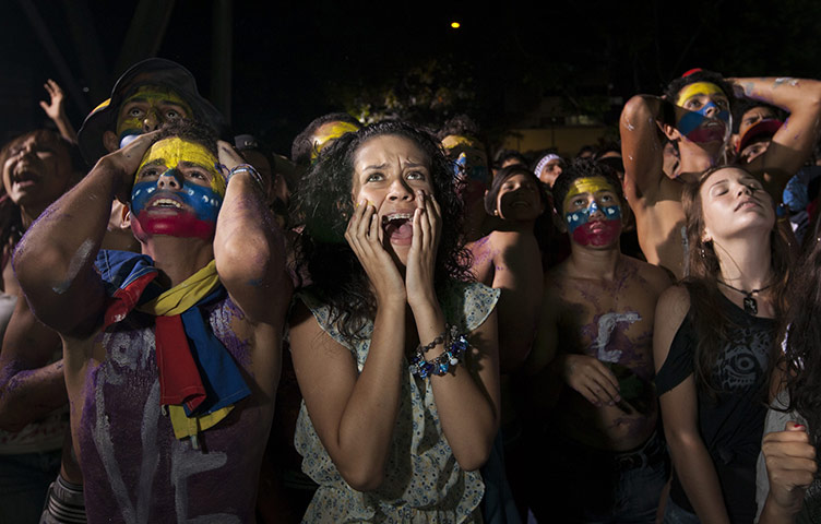 24 hours: Caracas, Venezuela: Venezuelan fans react after the team lost