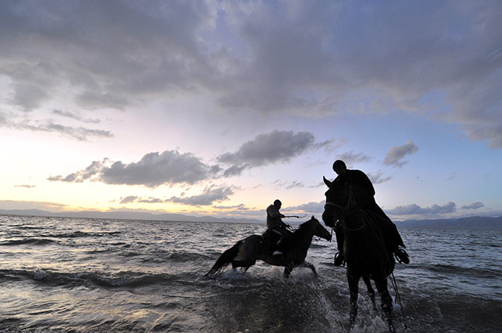 Son-Kul lake festival: Kyrgyz men ride horses