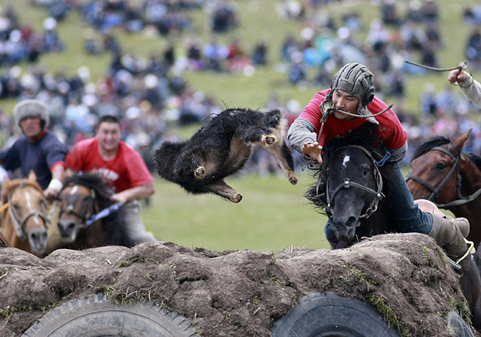 Son-Kul lake festival: Horsemen take part in a Kok-boru competition