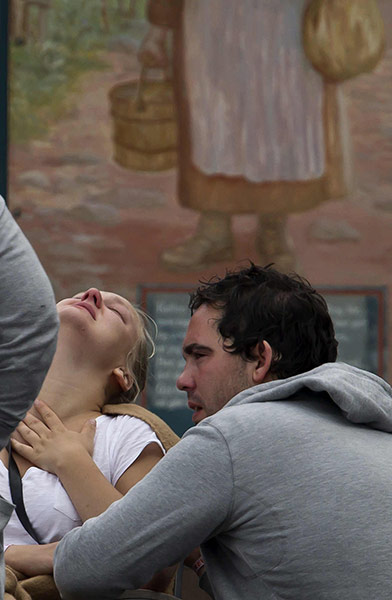 Norway Attack: A survivor from the shooting embraces a man in Sundvolden