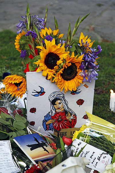 amy winehouse tributes: Flowers left by mourners in Camden Square 