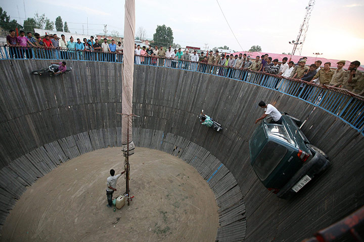 24 hours in pictures: wall of death stunt in srinagar, india