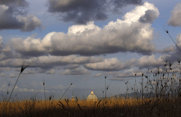 24 hours in pictures: Saint Peter's Square is seen from a hill in the north of Rome