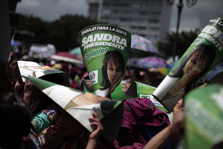 FTA: Jorge Dan Lopez: Supporters of Sandra Torres hold political posters in Guatemala City