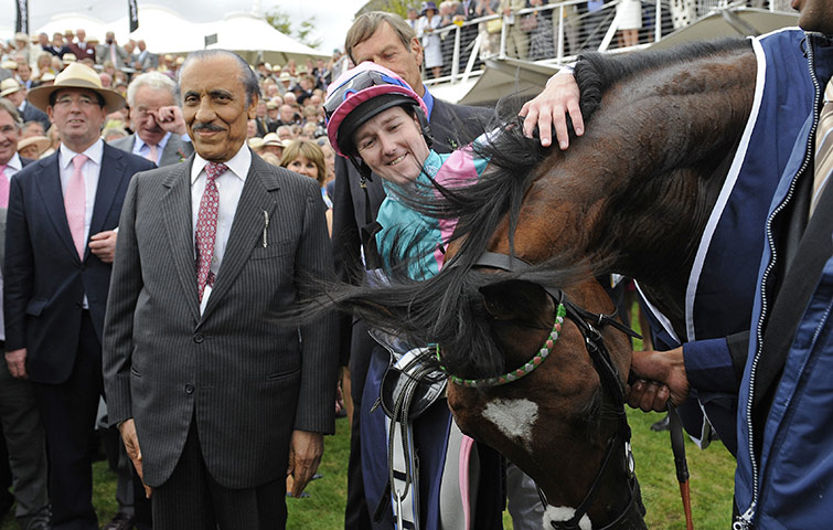 Glorious Goodwood: Tom Queally embraces Frankel as they celebrate winning the Sussex Stakes