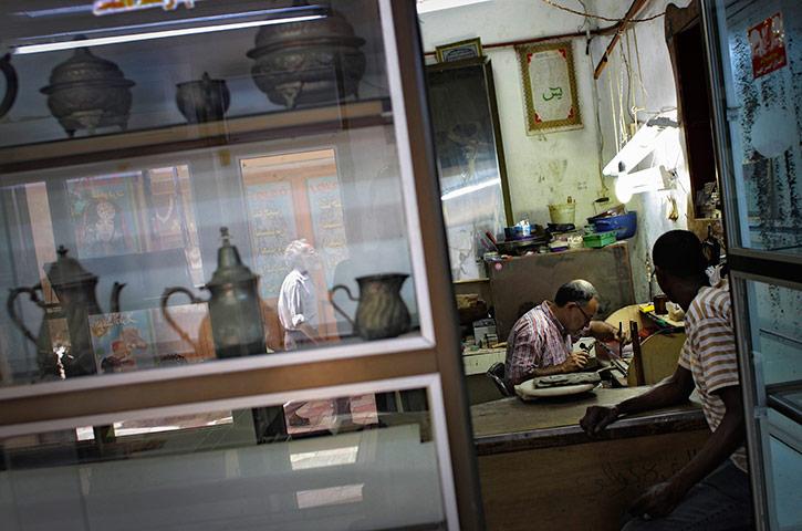 24 hours in pictures: Hammad Arajhi works in his jewellery workshop, Libya