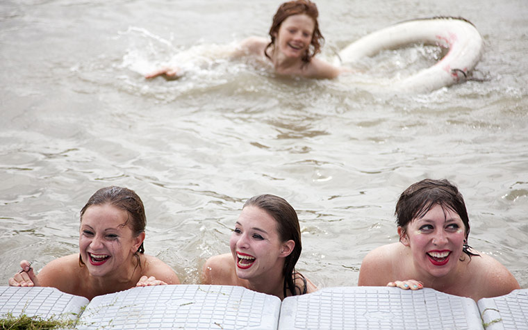 secret garden party: swimming in the river on sunday afternoon
