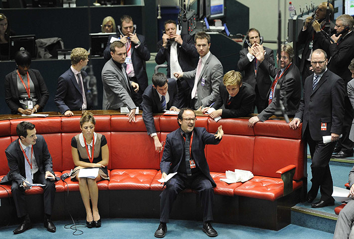 Week in Business: Traders and clerks work at the London Metal Exchange 