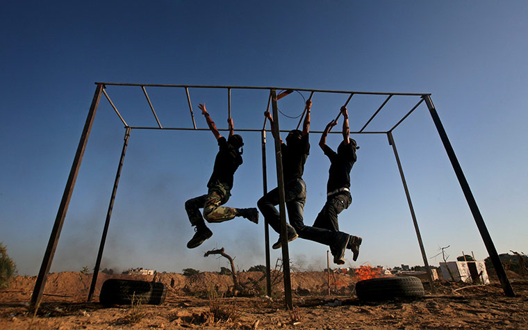 24 hours in pictures: Palestinian Islamic Jihad militants participate in a training session