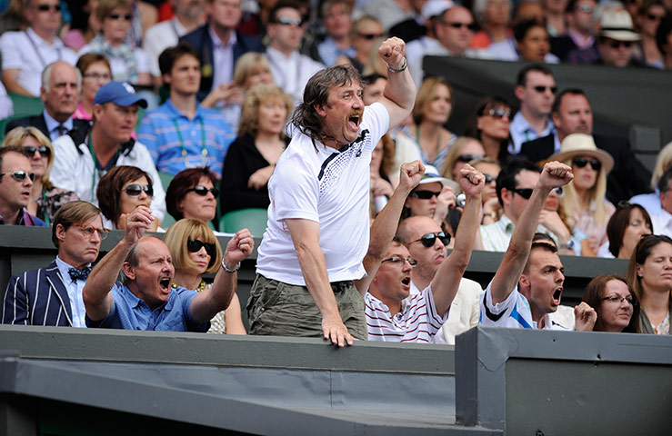 Ladies' final: Petra Kvitova's father celebrates a winning point