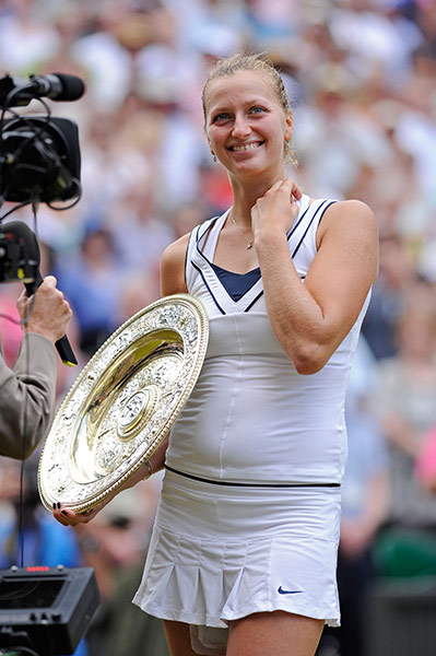 Ladies' final: Petra Kvitova smiles at her family whilst she is interviewed