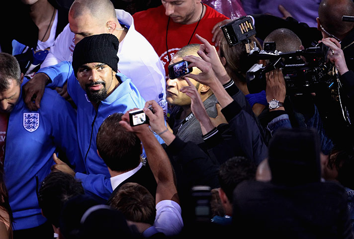 Haye v Klitschko: David Haye looks humbled as leaves the ring and heads to his dressing room