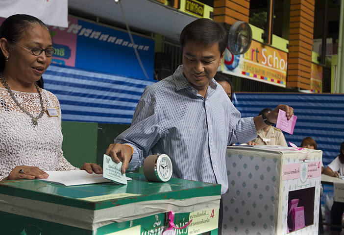 Thailand elections: Prime Minister Abhisit Vejjajiva casts his ballot