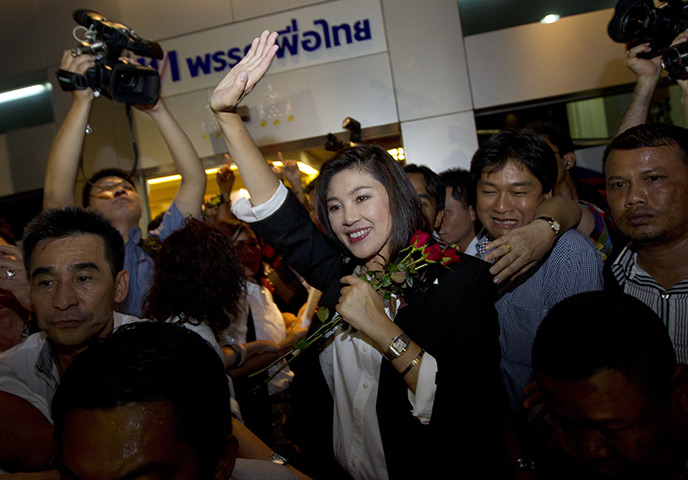 Thailand elections: Yingluck Shinawatra celebrates her win with her supporters