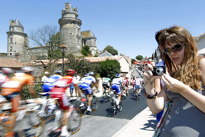 Tour de France Stage 3: Fan takes pictures during the third stage of the Tour de France