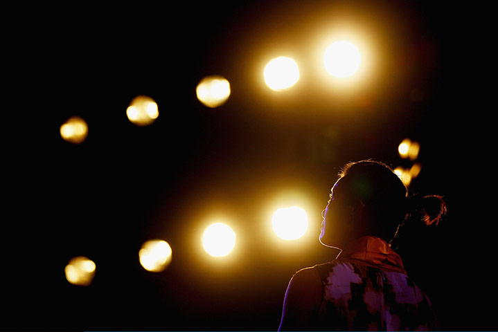 24 hours in pictures: French Open champion Li Na attends a celebration event with her fans, China
