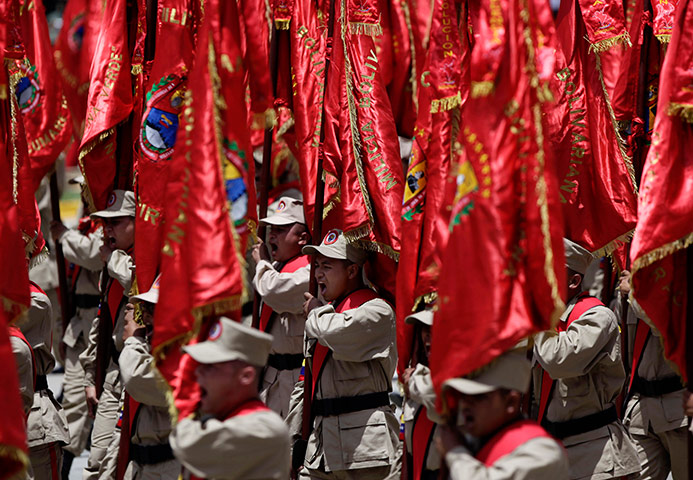 24 hours in pictures: Venezuela's Bolivarian Militias march during a parade