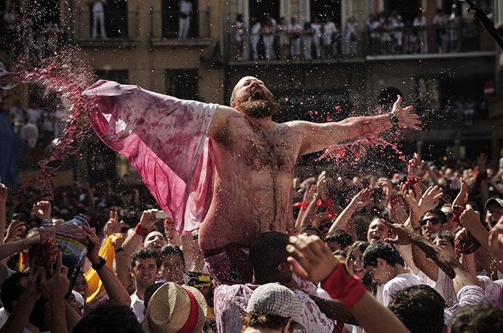 Pamplona revellers: Revellers celebrate the Chupinazo, the opening of the San Fermin fiestas