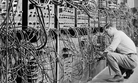 Man Working with early computer
