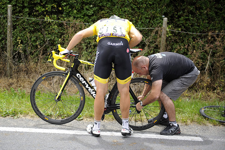 Tour de France Stage 6: Thor Hushovd has his flat tyre changed by a mechanic
