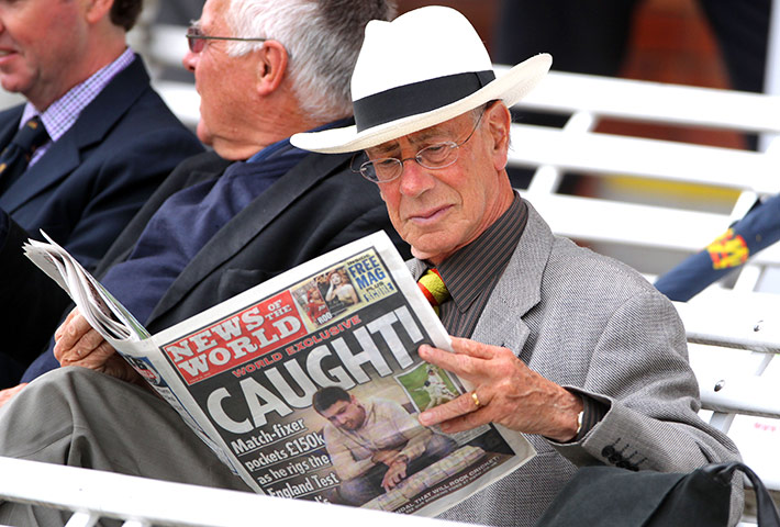 News of the World Update: An MCC member sits in the Lord's Pavilion reading the News of The World