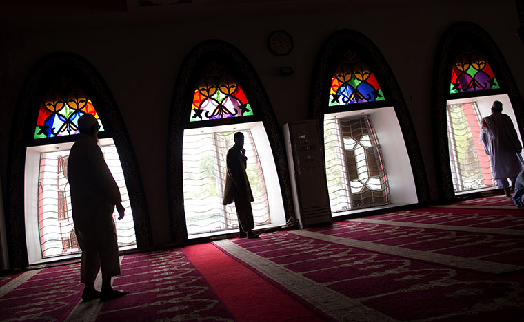 24 hours in pictures: Friday prayers at the Red Mosque in Pakistan