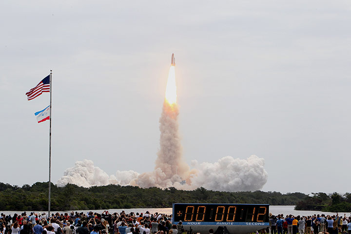 Shuttle Final Launch: The space shuttle Atlantis lifts off at Kennedy Space Center