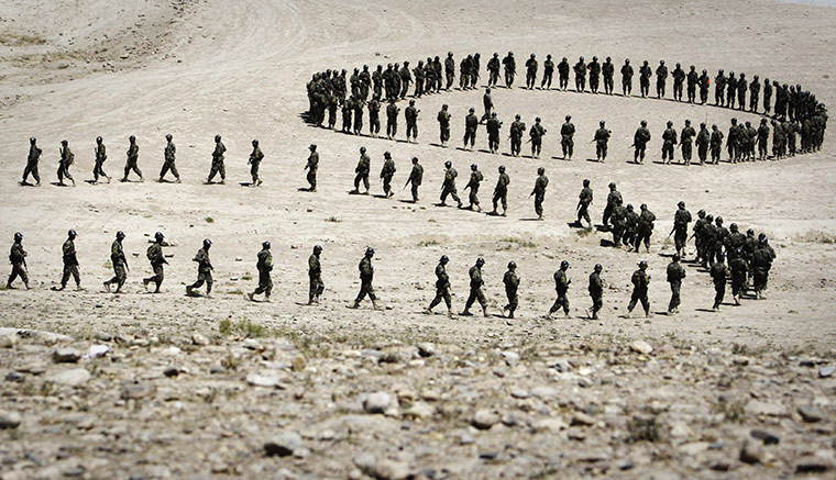 24 Hours in Pictures: Afghan National Army soldiers take part in a training exercise in Kabul