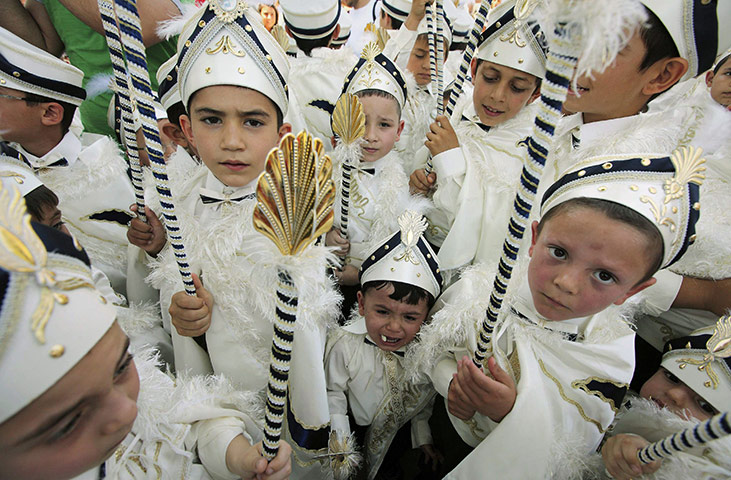 24 Hours in Pictures: Boys at a ceremony before their circumcision in Istanbul