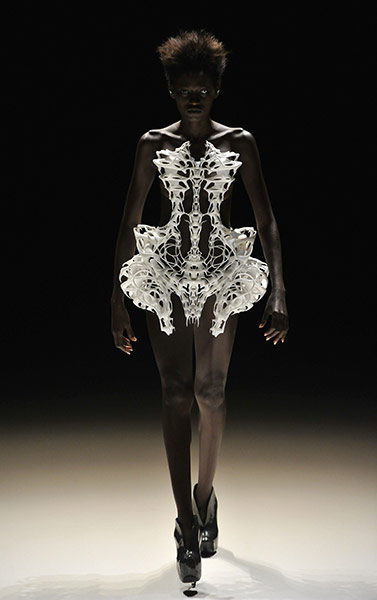 24 Hours in Pictures:  A model walks the catwalk at the Iris van Herpen Show in Berlin