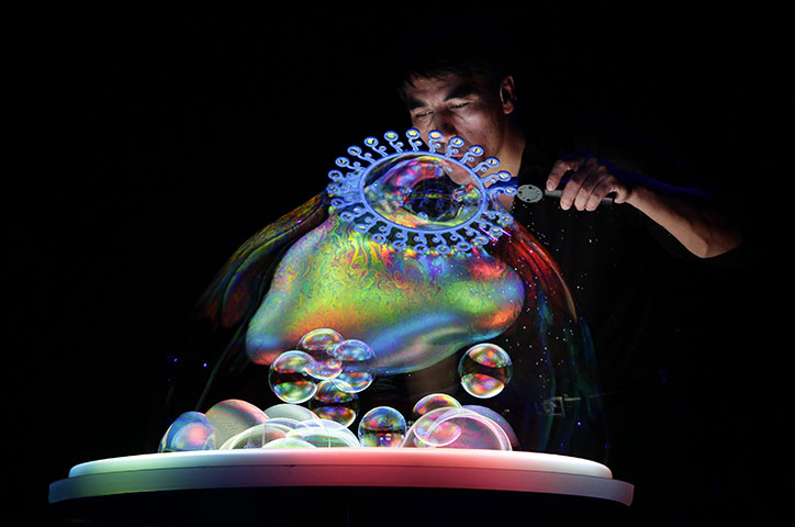 24 hours: Beijing, China: Canadian bubble artist Fan Yang performs