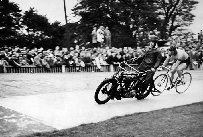 Herne Hill Velodrome: Cycle racing at Herne Hill, London, showing motor cycle pacer and cyclist.