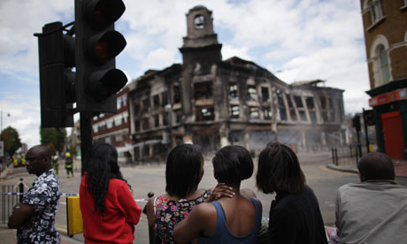 Police Contain The Area As Tottenham Recovers From Night Of Rioting