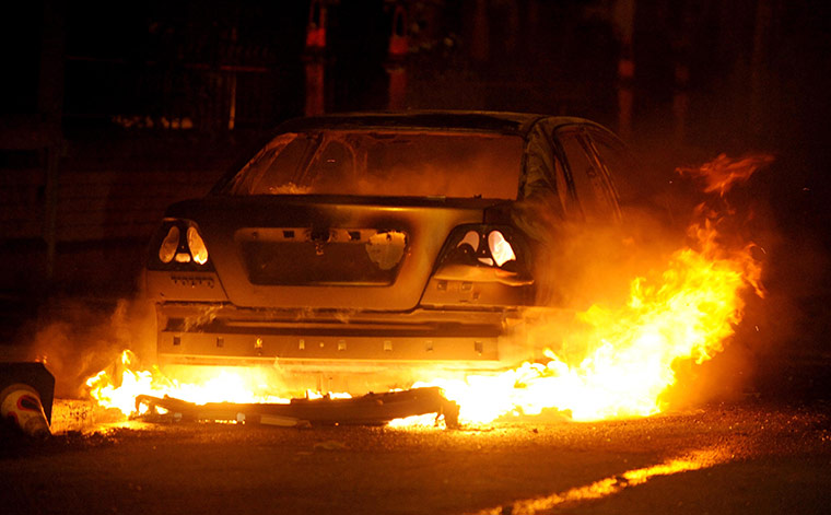 UK Riots: A burning car in the Toxteth area of Liverpool