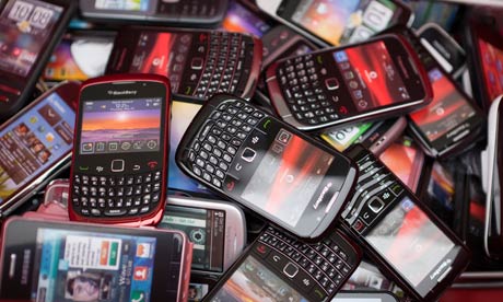 pile of smart mobile phones