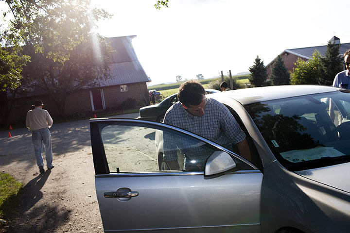 Republican rally in Iowa: Roland, Iowa: Rick Santorum leaves a campaign stop 