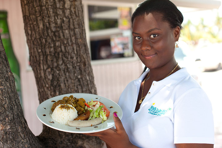 Cayman Islands: A genuine Caymanian meal of goat curry and rice on Grand Cayman