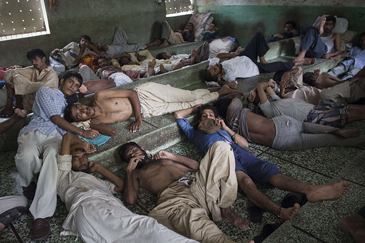 24 hours in pictures: Pakistani heroin addicts rest at the Edhi rehabilitation